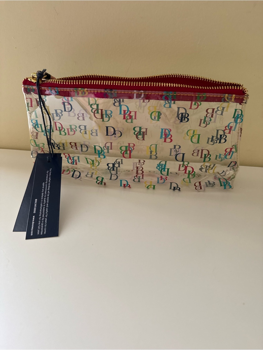 Brand New Dooney & Bourke IT On The Go Clear Signature Cosmetic Case See Through